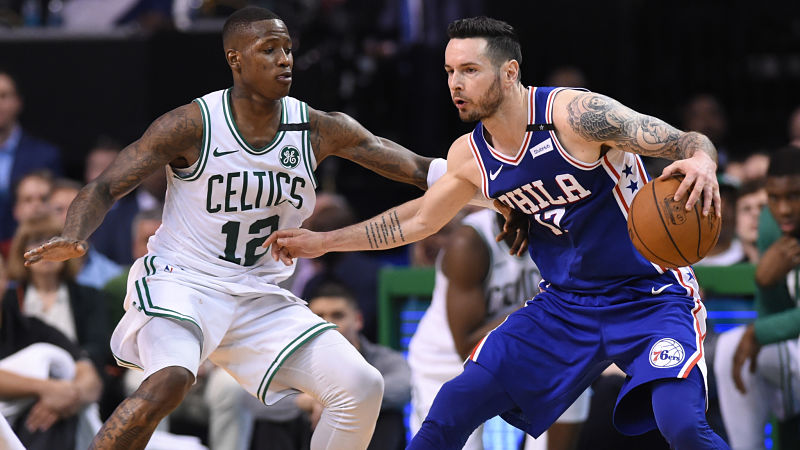 Boston Celtics guard Terry Rozier and Philadelphia 76ers guard J.J. Redick