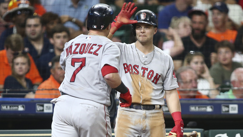 Boston Red Sox's Christian Vazquez And Andrew Benintendi