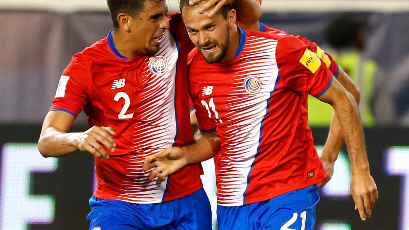 Costa Rica forward Marco Urena (21) and defender Johnny Acosta (2)