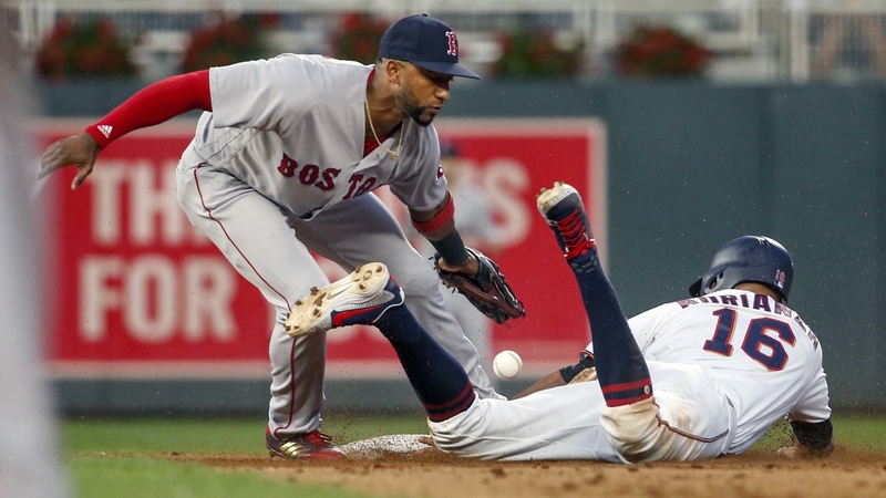 Boston Red Sox Second Baseman Eduardo Nunez And Minnesota Twins Shortstop Ehire Adrianza