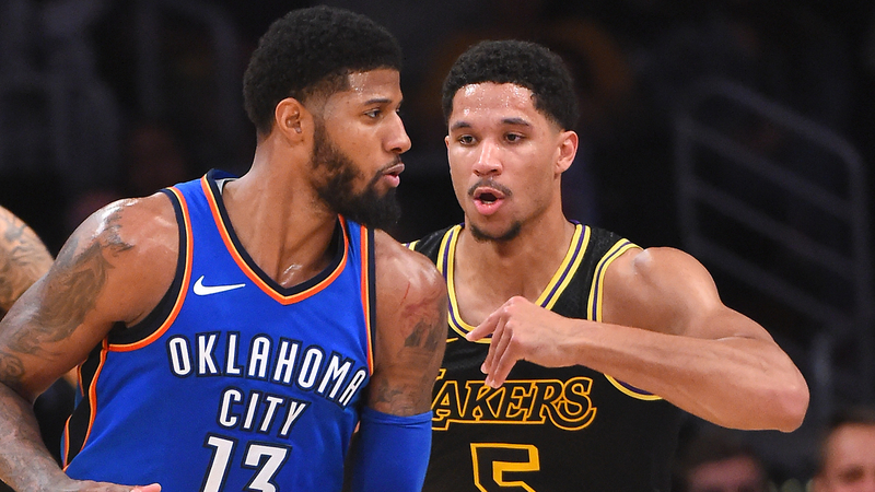 Paul George and Josh Hart