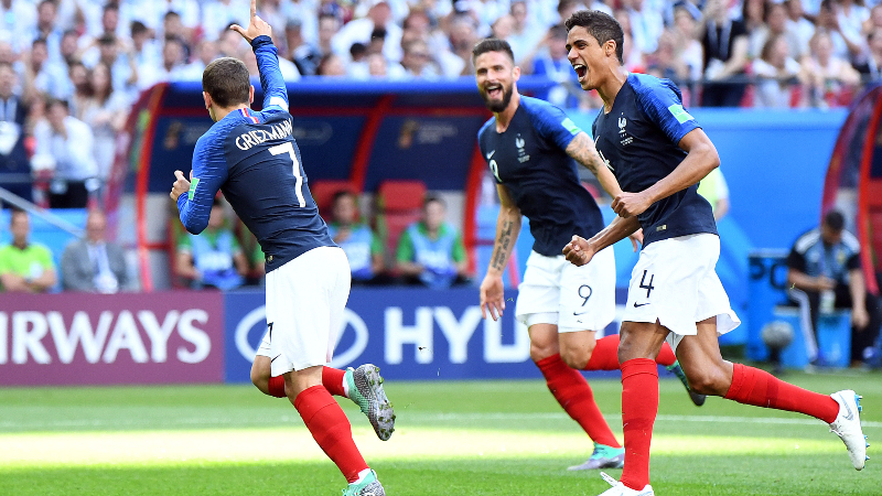 France forward Antoine Griezmann (7), defender Rafael Varane (4) and forward Olivier Giroud (9)