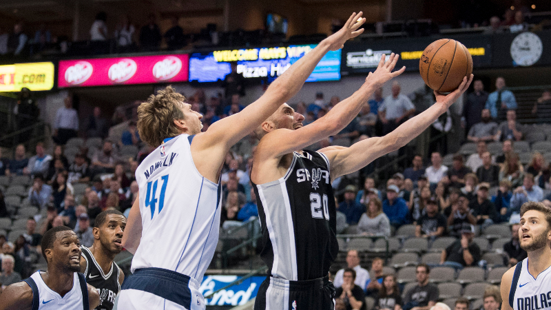 San Antonio Spurs guard Manu Ginobili (20) and Dallas Mavericks forward Dirk Nowitzki (41)