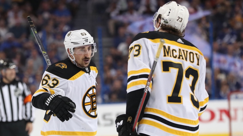 Boston Bruins Left Wing Brad Marchand And Defenseman Charlie McAvoy