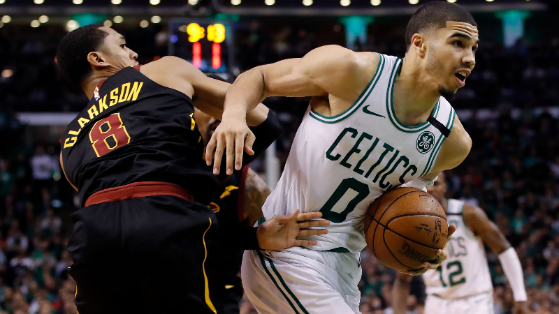 Boston Celtics forward Jayson Tatum and against Cleveland Cavaliers guard Jordan Clarkson