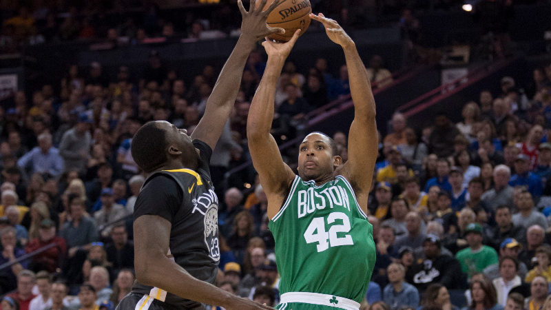Boston Celtics forward Al Horford (42) and Golden State Warriors forward Draymond Green (23)