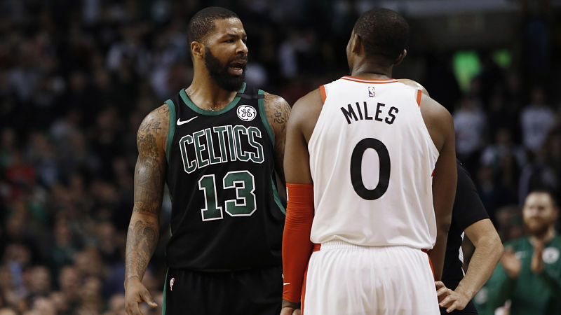 Boston Celtics forward Marcus Morris and Toronto Raptors guard C.J. Miles