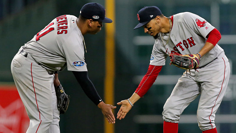 Boston Red Sox outfielder Mookie Betts and third baseman Rafael Devers