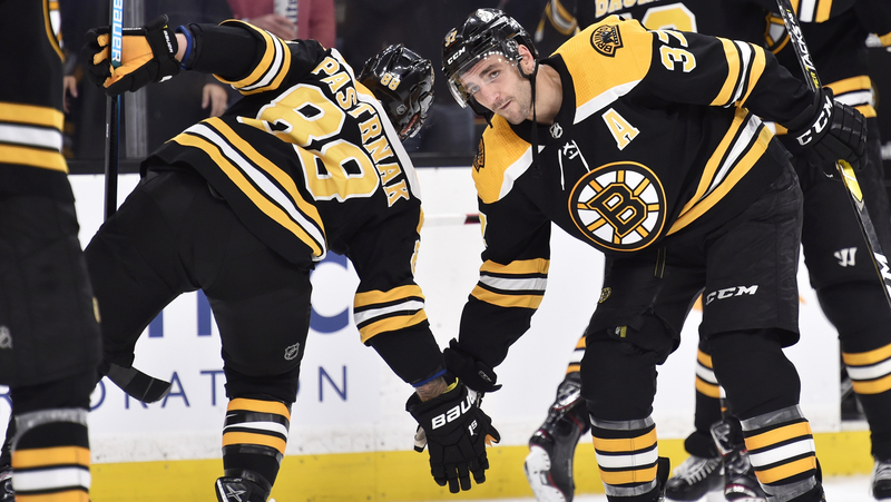 Boston Bruins' David Pastrnak And Patrice Bergeron