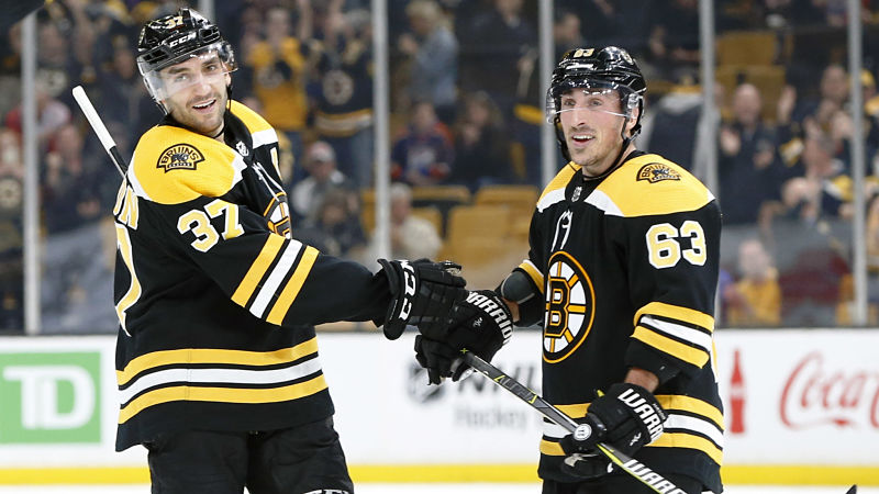 Boston Bruins forwards Patrice Bergeron and Brad Marchand