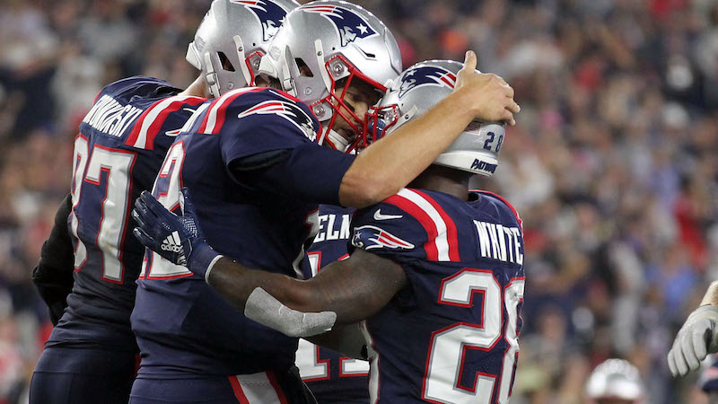 Patriots quarterback Tom Brady, running back James White