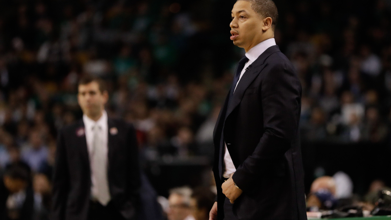 Ex- Cleveland Cavaliers head coach Tyronn Lue (foreground) and Boston Celtics head coach Brad Stevens