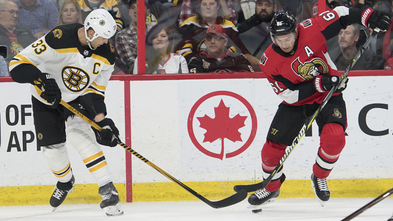 Boston Bruins defenseman Zdeno Chara and Ottawa Senators winger Mark Stone
