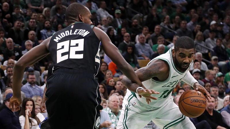 Milwaukee Bucks guard Khris Middleton and Boston Celtics guard Kyrie Irving