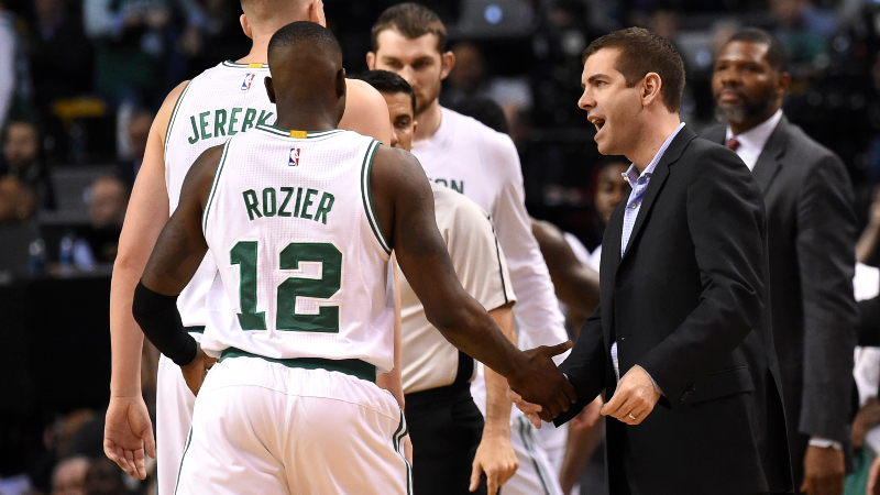 Boston Celtics head coach Brad Stevens and Celtics guard Terry Rozier (left)