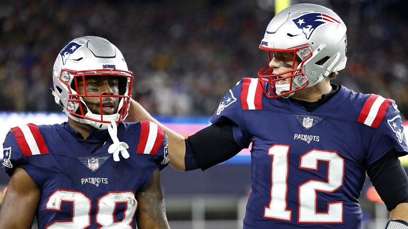 New England Patriots quarterback Tom Brady and running back James White