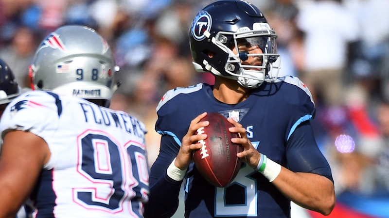 Patriots defensive end Trey Flowers, Titans quarterback Marcus Mariota
