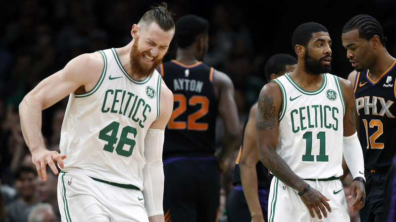 Boston Celtics' Aron Baynes And Kyrie Irving