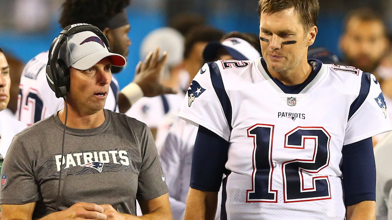 Patriots wide receivers coach Chad O'Shea, quarterback Tom Brady