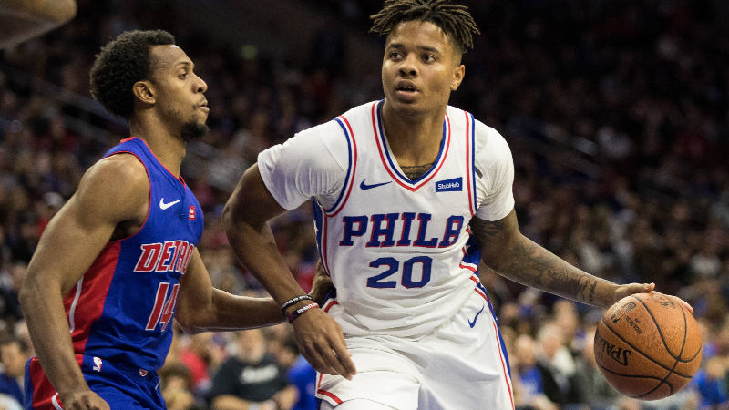 Philadelphia 76ers guard Markelle Fultz (20) and Detroit Pistons guard Ish Smith (14)