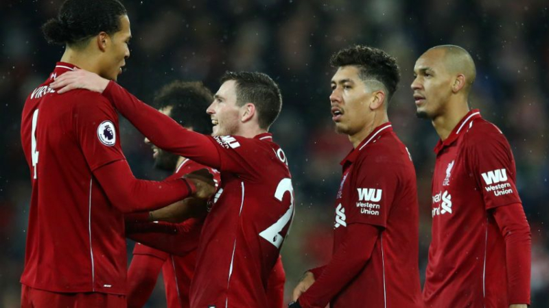 Liverpool players (from left to right) Virgil van Dijk, Andrew Roberton, Roberto Firmino, Fabinho