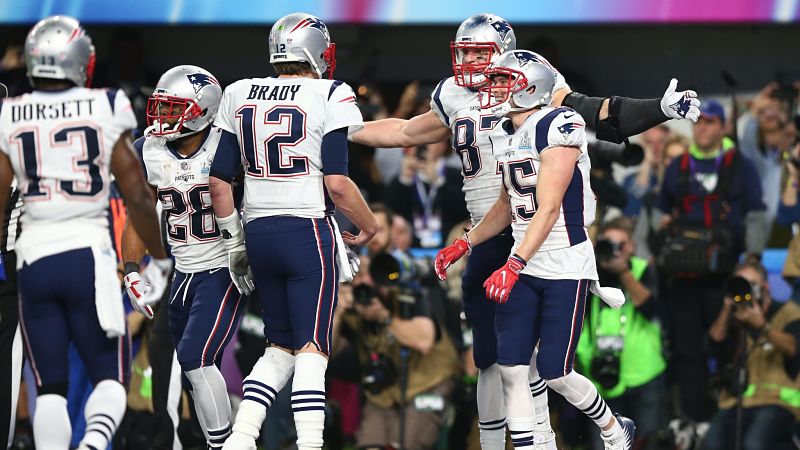 New England Patriots quarterback Tom Brady, tight end Rob Gronkowski and wide receiver Chris Hogan