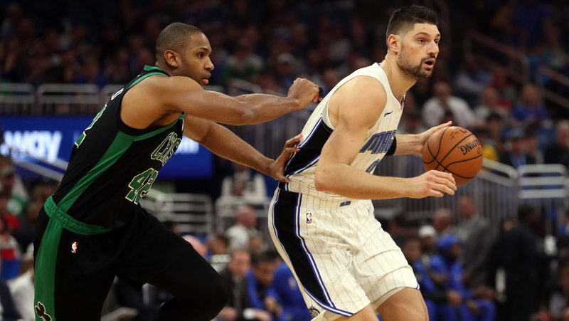 Boston Celtics' Al Horford And Orlando Magic's Nikola Vucevic