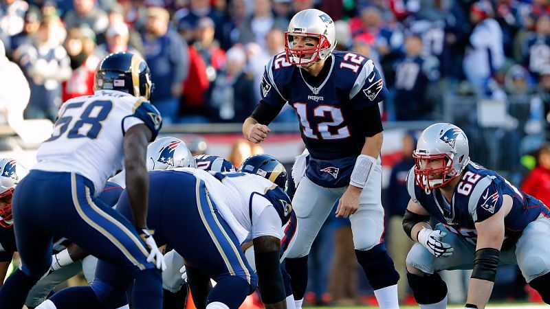 Los Angeles Rams linebacker Corey Littleton and New England Patriots quarterback Tom Brady