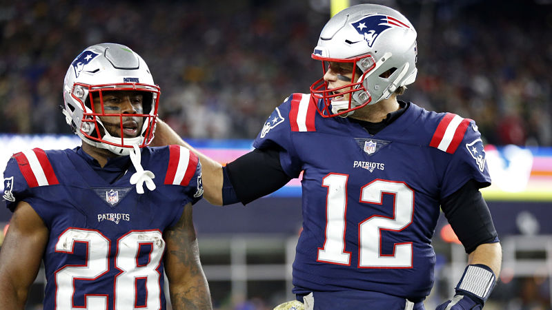New England Patriots running back James White and quarterback Tom Brady