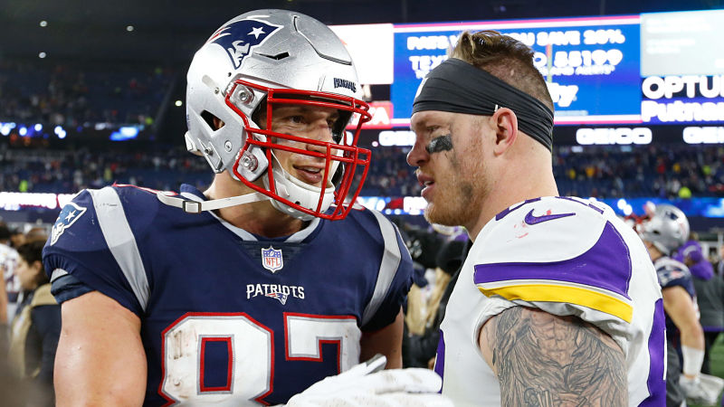 Rob Gronkowski and Minnesota Vikings tight end Kyle Rudolph