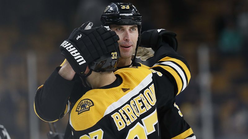 Boston Bruins players Patrice Bergeron and Zdeno Chara