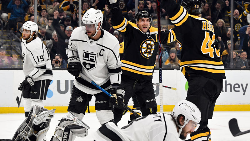 Bruins forwards Patrice Bergeron and Danton Heinen