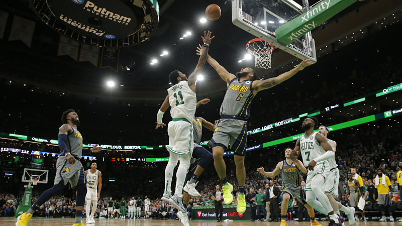 Boston Celtics guard Kyrie Irving and Indiana Pacers guard Cory Joseph