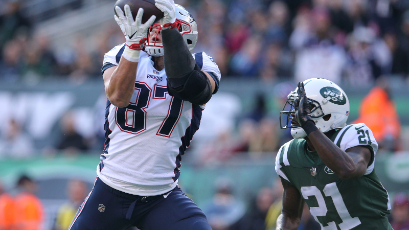 Ex-New England Patriots tight end Rob Gronkowski (87) and New York Jets cornerback Morris Claiborne