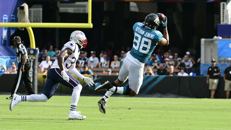 New England Patriots safety Devin McCourty and tight end Austin Seferian-Jenkins