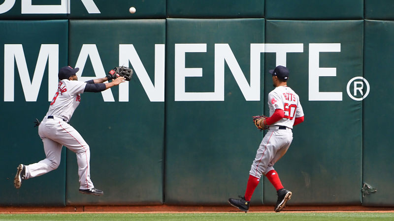 Boston Red Sox outfielders Jackie Bradley Jr., Mookie Betts