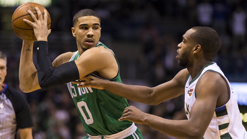 Boston Celtics forward Jayson Tatum and Milwaukee Bucks forward Khris Middleton