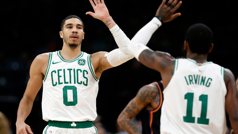 Boston Celtics forward Jayson Tatum (0) and guard Kyrie Irving