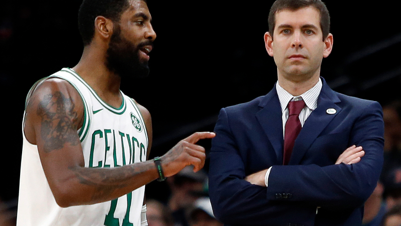 Boston Celtics guard Kyrie Irving (11) and head coach Brad Stevens