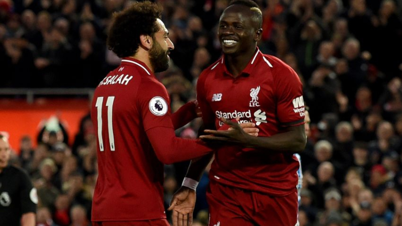 Liverpool forwards Mohamed Salah (11) and Sadio Mane