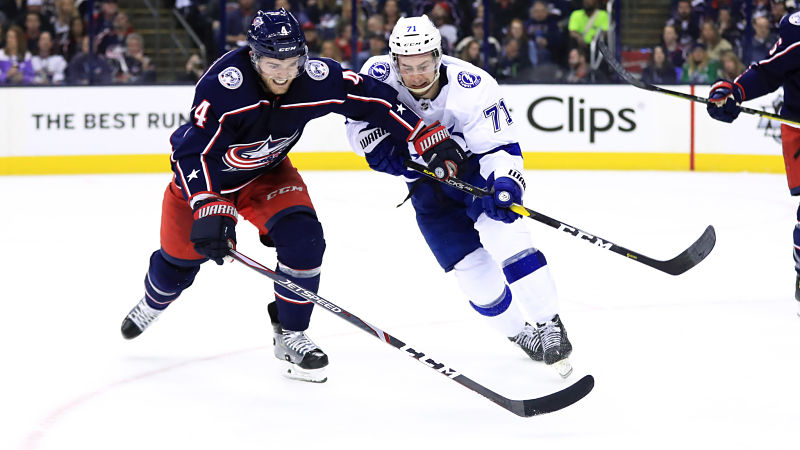 Columbus Blue Jackets defenseman Scott Harrington and Tampa Bay Lightning forward Anthony Cirelli