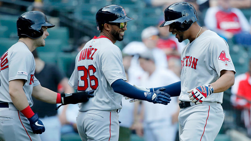 Boston Red Sox outfielder Andrew Benintendi and infielders Eduardo Nunez and Xander Bogaerts
