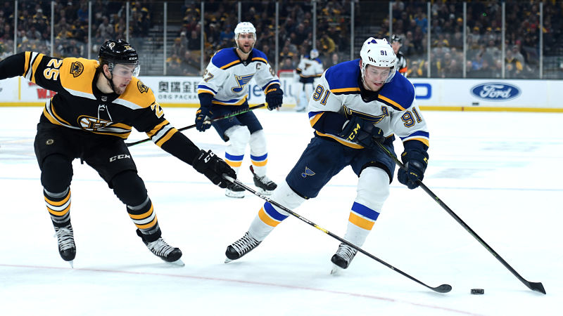 Boston Bruins defenseman Brandon Carlo, St. Louis Blues winger Vladimir Tarasenko
