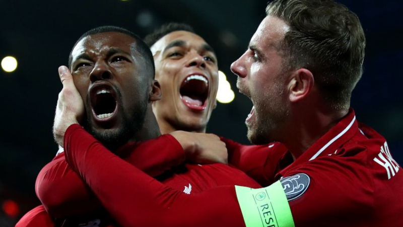 Liverpool's Georginio Wijnaldum (left), Trent Alexander-Arnold (center) and Jordan Henderson0