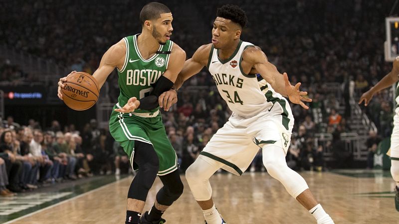 Boston Celtics guard Jayson Tatum and Milwaukee Bucks forward Giannis Antetokounmpo