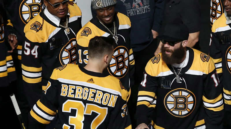Boston Bruins center Patrice Bergeron and New England Patriots receiver Julian Edelman