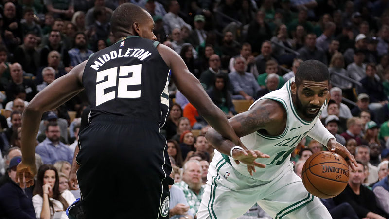 Milwaukee Bucks forward Khris Middleton and Boston Celtics guard Kyrie Irving