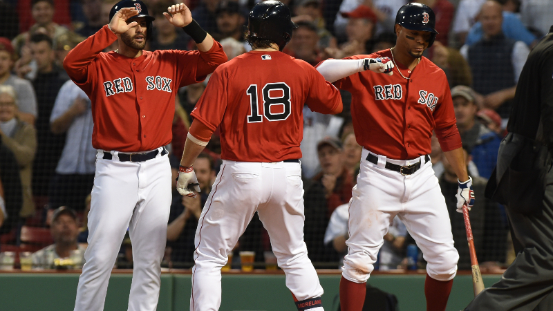 Boston Red Sox first baseman Mitch Moreland (center), designated hitter J.D. Martinez (left) and shortstop Xander Bogaerts (right)