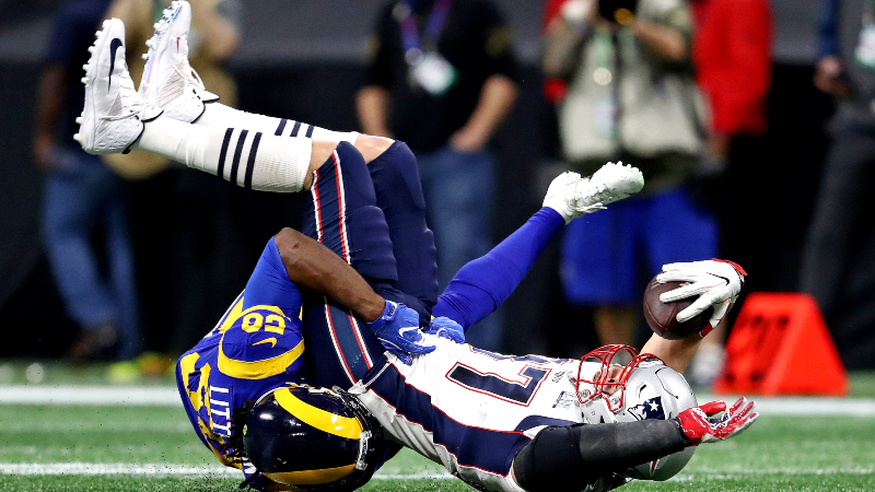 Former New England Patriots tight end Rob Gronkowski and Los Angeles Rams inside linebacker Cory Littleton (58)