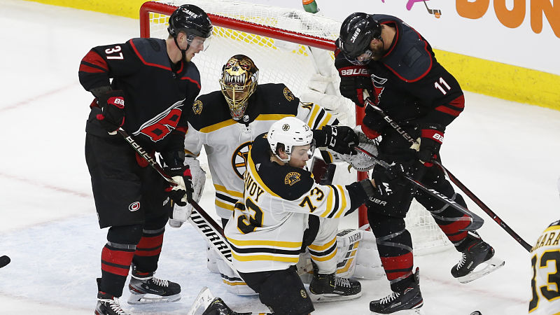 Boston Bruins goalie Tuukka Rask and defenseman Charlie McAvoy